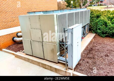 Horizontal shot of a large air conditioning and heating system for a residential complex. Stock Photo