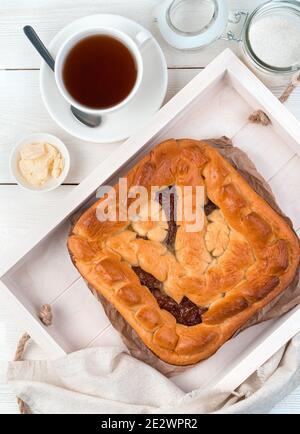 Breakfast with apple pie on a light background. Top view, with in space to copy. Stock Photo