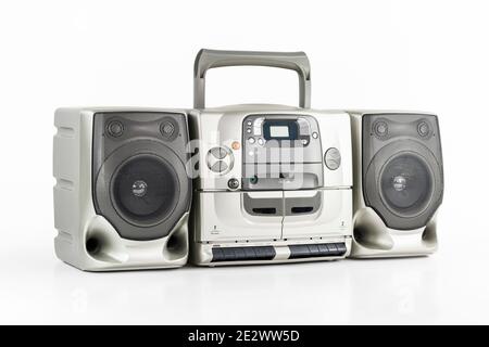 Vintage boom box radio, cd,  stereo cassette tape player and recorder on white.