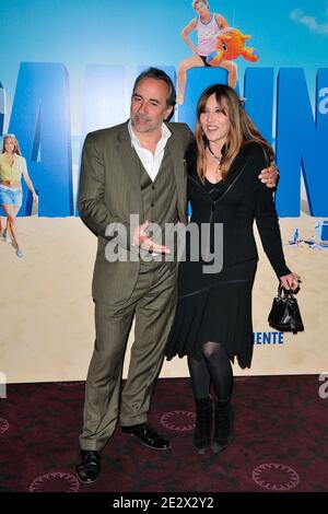 Antoine Dulery and Mathilde Seigner posing before the premiere of the movie 'Camping 2' held at the Gaumont Capucines theatre, in Paris, France, on April 13, 2010. Photo by Nicolas Genin/ABACAPRESS.COM Stock Photo