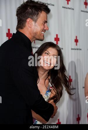 'Josh Duhamel and Fergie attend the American Red Cross: Santa Monica Chapter hosts annual red tie affair honoring Jada Pinkett Smith and the cast of ''Hawthorne'' at the Fairmont Hotel in Los Angeles, CA, USA on April 17, 2010. (Pictured: Fergie, Josh Duhamel). Photo by Lionel Hahn/ABACAPRESS.COM' Stock Photo