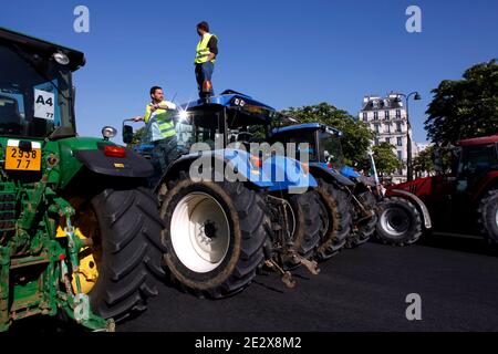 French farmers demonstrate with their tractors, Place de la Bastille in Paris, France on April 27, 2010 against wages cut and to denounce the European Farm Policy. Photo by Jean-Luc Luyssen/ABACAPRESS.COM Stock Photo