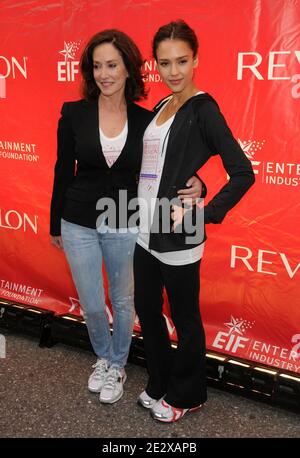 L-R: Lilly Tartikoff, Jessica Alba attends the 13th Annual EIF Revlon Run/Walk For Women, held in Times Square in New York City, NY, USA, on May 1, 2010. Stock Photo