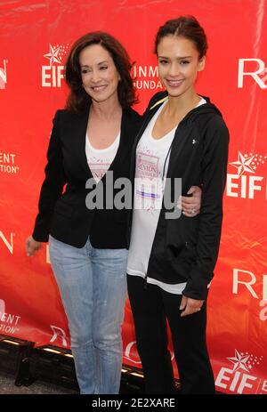 L-R: Lilly Tartikoff, Jessica Alba attends the 13th Annual EIF Revlon Run/Walk For Women, held in Times Square in New York City, NY, USA, on May 1, 2010. Stock Photo