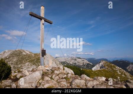 Summit cross on Traweng mountain in Austrian Alps. Tauplitz surroundings. Stock Photo