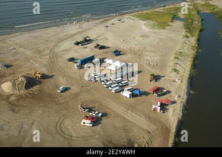 Exclusive Coverage - Aerial view of Workers contracted by BP May 24, 2010 in Elmer Island Louisiana. BP officials indicated on Saturday that the latest attempt to plug the source of the worst oil spill in U.S. history still hasn't been successful. Photo by Richard Shephard /ABACAPRESS.COM Please agree fees prior to usage. Stock Photo