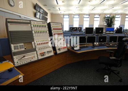 Room of control during the manufacture of the Large Hadron Collider (LHC) of the European Organization for Nuclear Research CERN (Centre Europeen de Recherche Nucleaire) in Meyrin, Switzerland on March 13, 2007. The Large Hadron Collider (LHC) is a gigantic scientific instrument near Geneva, where it spans the border between Switzerland and France about 100 m underground. It is a particle accelerator used by physicists to study the smallest known particles, the fundamental building blocks of all things. It will revolutionise our understanding, from the minuscule world deep within atoms to the Stock Photo