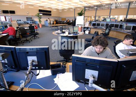 Room of control during the manufacture of the Large Hadron Collider (LHC) of the European Organization for Nuclear Research CERN (Centre Europeen de Recherche Nucleaire) in Meyrin, Switzerland on March 13, 2007. The Large Hadron Collider (LHC) is a gigantic scientific instrument near Geneva, where it spans the border between Switzerland and France about 100 m underground. It is a particle accelerator used by physicists to study the smallest known particles, the fundamental building blocks of all things. It will revolutionise our understanding, from the minuscule world deep within atoms to the Stock Photo