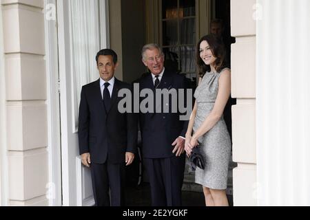 Prince Charles, Prince of Wales greets French President Nicolas Sarkozy and his wife Carla Bruni-Sarkozy at Clarence House in London, UK on June 18, 2010. Nicolas Sarkozy and World War II veterans visited London to mark the 70th anniversary of Charles de Gaulle's rousing radio appeal to his compatriots to resist the Nazi occupation. On June 18, 1940, four days after the fall of Paris and as the French government prepared to sign an armistice with Germany, the exiled military leader issued an impassioned appeal over the BBC airwaves to those back home. Photo by Elodie Gregoire/ABACAPRESS.COM Stock Photo
