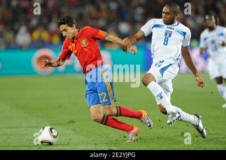 Spain's Jesus Navas battles Honduras's Wilson Palacios during the 2010 FIFA World Cup South Africa Soccer match, group H, Spainl vs Honduras at Ellis Park football stadium in Johannesburg, South Africa on June 21, 2010. Spain won 2-0. Photo by Henri Szwarc/ABACAPRESS.COM Stock Photo