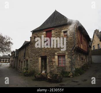 Panorama view of old ancient historic traditional typical half-timbered houses buildings in Malestroit Moreac Vannes Morbihan Brittany France Europe Stock Photo