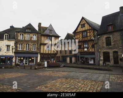 Panorama view of old ancient historic traditional typical half-timbered houses buildings on Bouffay main square in Malestroit Moreac Vannes Morbihan B Stock Photo