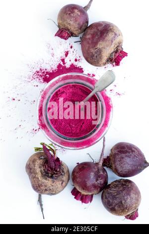 Beta vulgaris. Beetroot powder and beetroots Stock Photo
