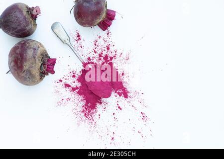 Beta vulgaris. Beetroot powder and beetroots Stock Photo
