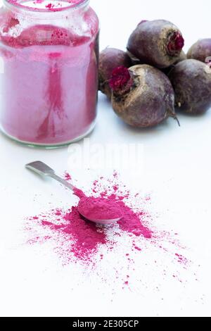 Beta vulgaris. Beetroot powder and beetroots Stock Photo