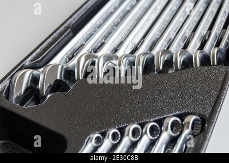 Set of Wrenches inside Toolbox, Keys and Spanners, A set of metric spanners or wrenches, open at one end, box or ring at the other. Close up macro. Stock Photo
