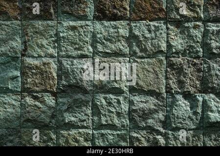 Indonesia Bali - Ubud stone wall background Stock Photo