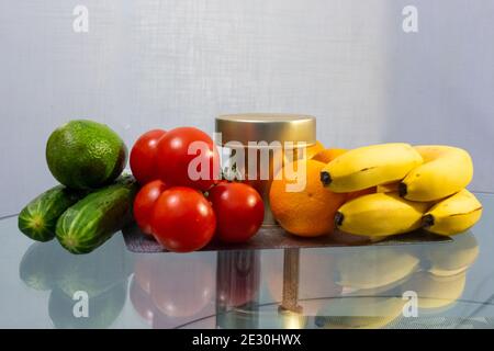 food, vegetables and fruits are on the table in the kitchen, donations for those in need during self-isolation and quarantine Stock Photo