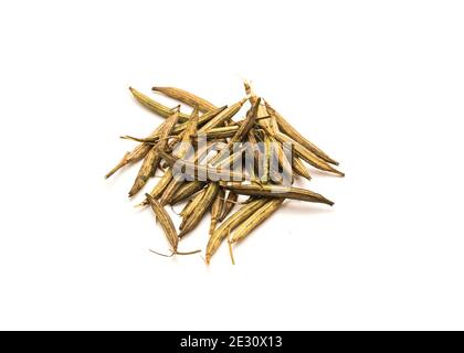 Pile of Egyptian Spinach Seed pods isolated on white background. Mulukhiyah, molokheyya, molokhia, mulukhiyyah Greek, Corchorus olitorius or jute, nal Stock Photo