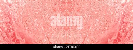 blue transparent clean drinking water abstract background. water surface with air bubbles red pink background Stock Photo