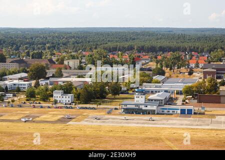 Strausberg, Germany - August 19, 2020: Strausberg Airport Terminal and Tower aerial view in Germany. Stock Photo