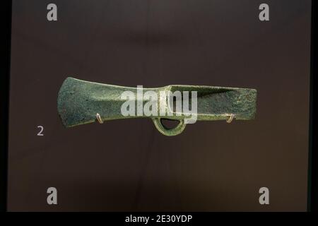 A copper alloy axe (called a palstave) found in a Bronze Age (10300-1000BC) hoard near Monkton Deverill, Salisbury Museum, Salisbury, Wiltshire, UK. Stock Photo