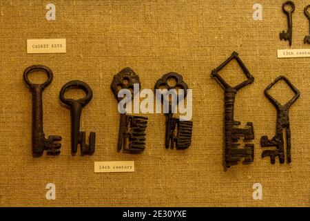 A selection of old casket keys from the 14th century on display in The Salisbury Museum, Salisbury, Wiltshire, UK. Stock Photo