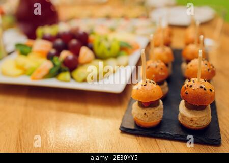 catering services background with snacks on guests table in restaurant at event party Stock Photo