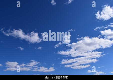 Blue sky and lots small clouds pattern. Deep blue sky and clouds Stock Photo