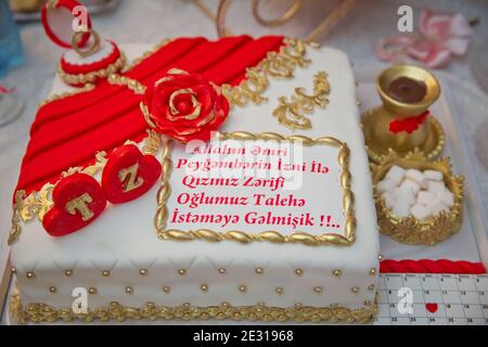 A white cake made for Hari . By God's command, with the permission of the Prophet, we have come to ask for your daughter for our son . A cake made for Stock Photo