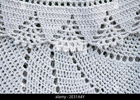 Two white crochets carpets over each other Stock Photo