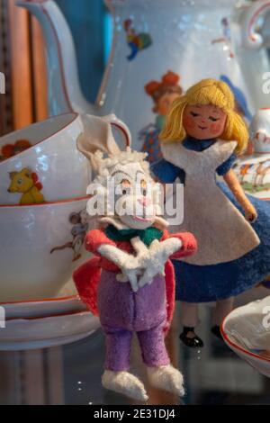 Vintage 1950s fairytale figures among a child's tea set. Stock Photo