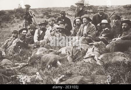 Vintage 19th century photograph: hunters with their catch of deer, South Africa. Stock Photo
