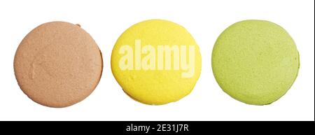 Closeup three different colored macaroons isolated on white. Top view. Stock Photo