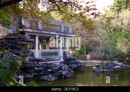 Mei Foo, Hong Kong - 21 Dec 2020: Lingnan Garden - a Chinese-style architecture park next to Mei Foo Sun Chuen Stock Photo