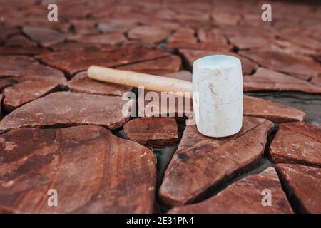 Professional installation of tiles on glue - high quality exterior finishing works - building Stock Photo