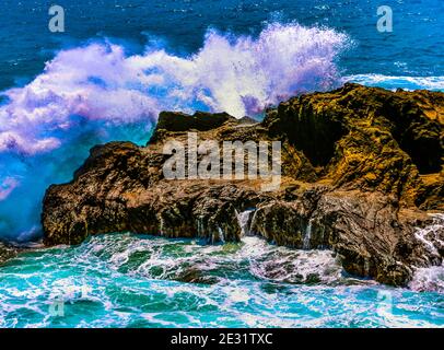 Honolulu , Oahu,  Hawaii, USA - September 4, 2015:  Sandy Beach Park,  including Halona Blow Hole and Koko Head crater, is a beautiful location for su Stock Photo