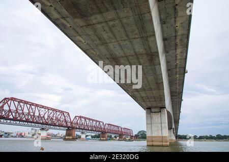 Syed Nazrul Islam Bridge and Bhairab rail way bridges over the Meghna River, Bangladesh. Stock Photo