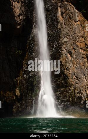 Lower part of the Vazra Sakla Waterfall splashing over rocks into a pool at Virdi, Karnataka, India Stock Photo