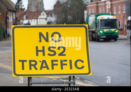 Amersham, Buckinghamshire, UK. 11th January, 2021. A sign for No HS2 traffic. The number of HGVs going through villages in Buckinghamshire is vast. HS2 are carrying out utility works at the bottom of Gore Hill in Amersham on A355 and A413. One of five ventilation shafts for the new High Speed Rail is being built nearby where a tunnel for the train will go underneath the Chilterns. The controversial High Speed Rail from London to Birmingham is massively over budget. Credit: Maureen McLean/Alamy Stock Photo