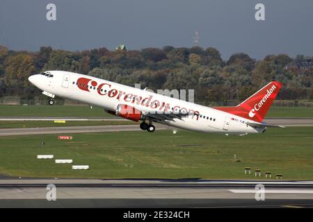 Turkish Corendon Airlines Boeing 737-400 with registration TC-TJE just airborne at Dusseldorf Airport. Stock Photo