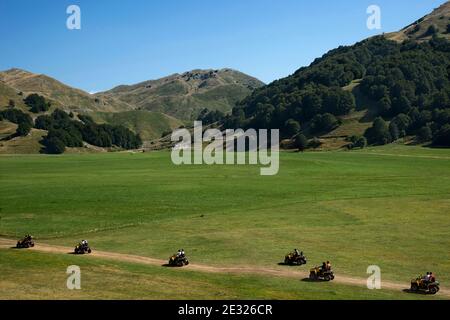 Campitello Matese (CB), Molise Region, Italy: Tourists with quads leave for an excursion on the Campitello Matese plain. Stock Photo