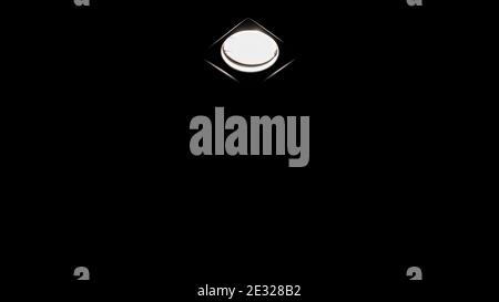 Glowing lantern on a black background, the lamp is shining, LED light. Stock Photo