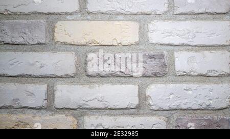White brick wall, brick texture, background from white natural bricks. Stock Photo