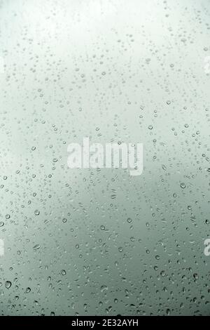 Raindrops on window pane Stock Photo