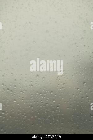 Raindrops on window pane Stock Photo