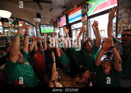 Football fans watch the final world cup 2010 match between Spain and Netherlands at the Felix restaurant in New York City, Ny, USA on July 11, 2010. Photo by Mehdi Taamallah/Cameleon/ABACAPRESS.COM Stock Photo