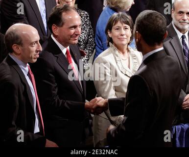 '(R-L) U.S. Commodity Futures Trading Commission Chairman Gary Gensler, Comptroller of the Currency John Dugan, FDIC Chair Sheila Bair and Federal Reserve Bank Chairman Ben Bernanke greet U.S. President Barack Obama after he signed the financial reform bill into law during a ceremony at the Ronald Reagan Building and International Trade Center July 21, 2010 in Washington, DC. A sweeping expansion of federal financial regulation in the wake of the worst recession since the Great Depression, the bill will create a consumer protection agency, lay out a blueprint for disassembling financial entiti Stock Photo
