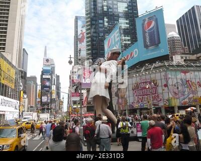 'Unconditional Surrender' is a 26 foot statue replica of the legendary photograph by Alfred Eisenstaedt (that portrays an American sailor kissing a young woman in a white dress on V-J Day in Times Square on August 14, 1945, the photograph was originally published a week later in Life magazine) created the day World War II ended by artist John Seward Johnson II, in Times Square, New York City, NY, USA, on August 13, 2010. Photo by Charles Guerin/ABACAPRESS.COM Stock Photo