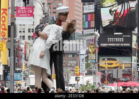 'Unconditional Surrender' is a 26 foot statue replica of the legendary photograph by Alfred Eisenstaedt (that portrays an American sailor kissing a young woman in a white dress on V-J Day in Times Square on August 14, 1945, the photograph was originally published a week later in Life magazine) created the day World War II ended by artist John Seward Johnson II, in Times Square, New York City, NY, USA, on August 13, 2010. Photo by Charles Guerin/ABACAPRESS.COM Stock Photo